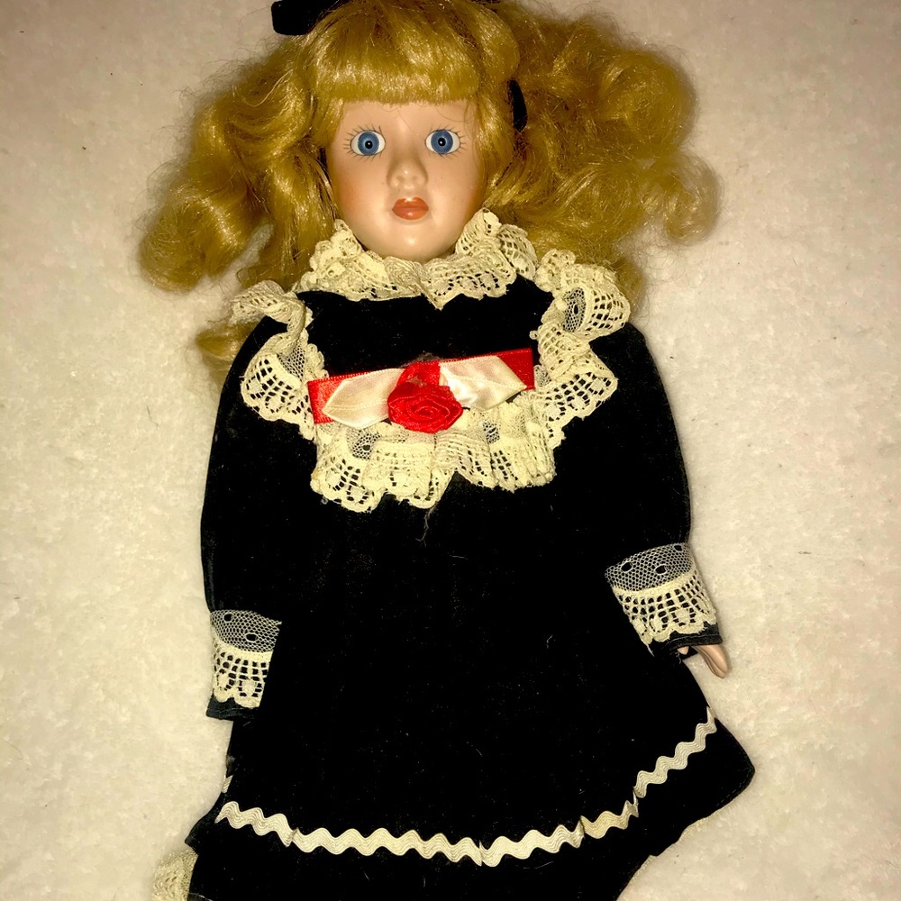 Heritage porcelain Doll